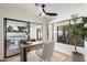 Inviting office with views of the pool, modern desk and comfortable seating at 7553 E Woodshire Cv, Scottsdale, AZ 85258
