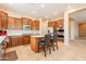 Stylish kitchen with stainless appliances and a functional center island at 7654 W Congressional Way, Florence, AZ 85132