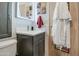 Bathroom featuring an illuminated mirror, stylish vanity, and modern fixtures at 7750 E Broadway Rd # 475, Mesa, AZ 85208