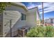 A manufactured home showing the side exterior with an air conditioning unit at 7750 E Broadway Rd # 475, Mesa, AZ 85208