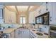 Well-lit kitchen featuring white cabinets and modern appliances, perfect for culinary adventures at 7750 E Broadway Rd # 475, Mesa, AZ 85208