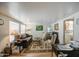 Inviting living room with cozy seating, a decorative rug, and natural light at 7750 E Broadway Rd # 475, Mesa, AZ 85208