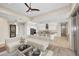 View of the open-concept living room, showcasing the connection between living room and kitchen at 8514 E Krail St, Scottsdale, AZ 85250