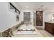 Large soaking tub featuring decorative tile and windows for natural light at 8737 E San Vicente Dr, Scottsdale, AZ 85258