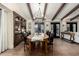 Elegant dining room featuring coffered ceilings, chandelier, and french doors leading to the outdoors at 8737 E San Vicente Dr, Scottsdale, AZ 85258