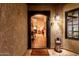 Beautiful home foyer showcasing tile flooring, chandelier lighting, and a charming console table at 8737 E San Vicente Dr, Scottsdale, AZ 85258