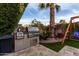 Well-equipped outdoor kitchen and grill area, ideal for al fresco dining and entertaining at 8737 E San Vicente Dr, Scottsdale, AZ 85258