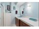 Charming bathroom with blue walls, retro fixtures, and walk-in shower at 945 W 10Th St, Mesa, AZ 85201