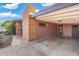 Brick carport offers covered parking with easy access to the home's entrance at 945 W 10Th St, Mesa, AZ 85201