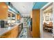 Well-maintained kitchen with ample counter space, adjacent to the dining area at 945 W 10Th St, Mesa, AZ 85201