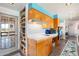 Charming kitchen featuring light wood cabinets, light countertops, and ample storage at 945 W 10Th St, Mesa, AZ 85201