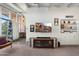 Bright living room with built-in shelves, a modern entertainment center and ample natural light at 945 W 10Th St, Mesa, AZ 85201