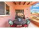 Enclosed patio area with furniture is ideal for outdoor relaxing and dining at 945 W 10Th St, Mesa, AZ 85201