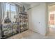 Bright bedroom with large window and custom shelving showcasing the homeowner's Lego collection at 1232 E Silver Reef Dr, Casa Grande, AZ 85122