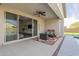 Inviting covered patio featuring a cozy seating area with a modern fire pit and easy access to the pool at 1232 E Silver Reef Dr, Casa Grande, AZ 85122