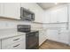 Bright kitchen showcasing white cabinetry, stainless steel appliances, and sleek countertops at 1232 E Silver Reef Dr, Casa Grande, AZ 85122