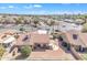 Inviting backyard with patio, low-maintenance landscaping, and block fence at 13764 W Meeker Blvd, Sun City West, AZ 85375