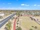 Lush community park offering walking paths, trees, and open green spaces at 13764 W Meeker Blvd, Sun City West, AZ 85375