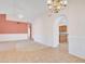 Inviting living room featuring tile flooring, high ceilings, and neutral walls at 13764 W Meeker Blvd, Sun City West, AZ 85375