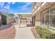 Covered patio with a concrete floor offers an ideal spot for outdoor relaxation and entertaining at 13764 W Meeker Blvd, Sun City West, AZ 85375