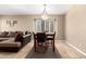 Well-lit dining area with travertine floors, perfect for gatherings and everyday meals at 1421 E Gary Dr, Chandler, AZ 85225