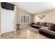 Cozy living room with large windows and neutral tones, offering a comfortable and relaxing space at 1421 E Gary Dr, Chandler, AZ 85225