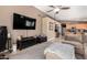 Open-concept living area connecting the kitchen, featuring neutral tones and ample natural light at 1421 E Gary Dr, Chandler, AZ 85225