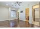 Spacious bedroom featuring hardwood flooring, a closet, and an attached bath at 15135 E Monument Rd, Scottsdale, AZ 85262