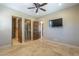 Main bedroom features tile floors, walk-in closet, and adjacent bathroom, offering comfort and convenience at 15135 E Monument Rd, Scottsdale, AZ 85262