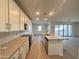 Well-equipped kitchen with ample counter space and modern finishes at 15781 W Cheryl Dr, Waddell, AZ 85355