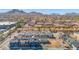 Expansive aerial view of a new residential community nestled against a backdrop of mountains at 16875 N 12Th St # 32, Phoenix, AZ 85022