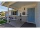 Charming home entrance featuring a decorative door, manicured landscaping, and inviting details at 1749 E Medlock Dr, Phoenix, AZ 85016