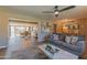 Open-concept living room with a view of the dining area and stylish furnishings at 1749 E Medlock Dr, Phoenix, AZ 85016