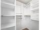 Organized closet with ample shelving and rods provides plenty of storage space at 18250 N Cave Creek Rd # 105, Phoenix, AZ 85032