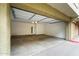 Attached garage with automatic door and unit number above provides convenient parking at 18250 N Cave Creek Rd # 105, Phoenix, AZ 85032