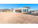 New construction home featuring an expansive backyard with large windows at 18742 N 269Th Ln, Buckeye, AZ 85396