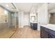 Elegant bathroom featuring a glass shower, double vanity, and modern fixtures at 18742 N 269Th Ln, Buckeye, AZ 85396