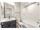 Stylish bathroom featuring a modern vanity, tiled shower, and contemporary fixtures at 18742 N 269Th Ln, Buckeye, AZ 85396