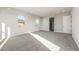 Bright bedroom with carpet and natural light streaming in from the exterior windows at 18742 N 269Th Ln, Buckeye, AZ 85396