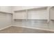 Spacious, walk-in closet with adjustable shelving and ample storage space at 18742 N 269Th Ln, Buckeye, AZ 85396