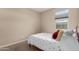 Cozy bedroom featuring carpet and a window for natural light at 2013 E Brooklyn Dr, Casa Grande, AZ 85122