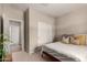 Well-lit bedroom with a sliding door closet, neutral walls, and cozy carpet at 2013 E Brooklyn Dr, Casa Grande, AZ 85122