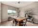 Eat-in kitchen features a large window for natural light, with wood-look tile floors at 2013 E Brooklyn Dr, Casa Grande, AZ 85122