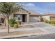 A lovely single-Gathering home boasts well-maintained landscaping and a spacious two-car garage at 22644 E Quintero Ct, Queen Creek, AZ 85142