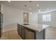 Kitchen island with stainless steel faucet and sink at 22644 E Quintero Ct, Queen Creek, AZ 85142