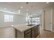 Modern kitchen island with stainless steel faucet and sink at 22644 E Quintero Ct, Queen Creek, AZ 85142