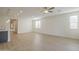 Bright living room with hardwood floors, recessed lighting, and a view of the kitchen at 22644 E Quintero Ct, Queen Creek, AZ 85142