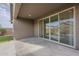 Covered patio with large sliding glass doors providing indoor-outdoor living and backyard view at 22644 E Quintero Ct, Queen Creek, AZ 85142