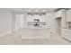 Well-lit kitchen with stainless appliances, white cabinetry, and granite countertops at 2649 N Riverside Dr, Florence, AZ 85132