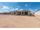 View of the backyard showing a patio, and expansive space for outdoor enjoyment at 26973 W Lone Cactus Dr, Buckeye, AZ 85396